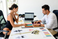 //rqrorwxhjpqklq5p.ldycdn.com/cloud/poBprKqklrSRolimkkolkq/Designer-Reviewing-Swimwear-Swatch-Book.jpg